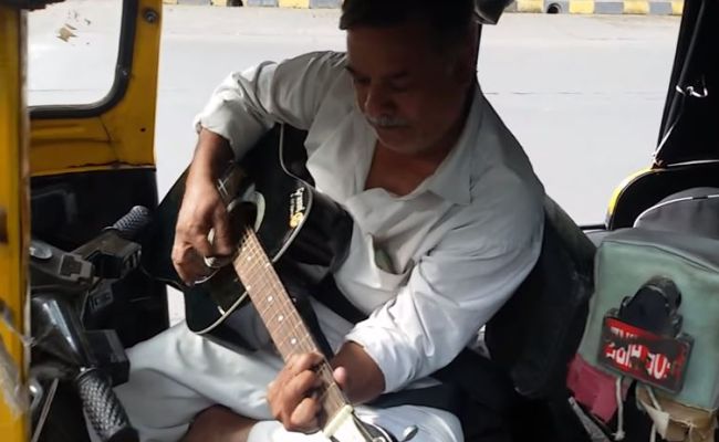 This Mumbai autowallah is just amazing with guitar This Mumbai autowallah is just amazing with guitar