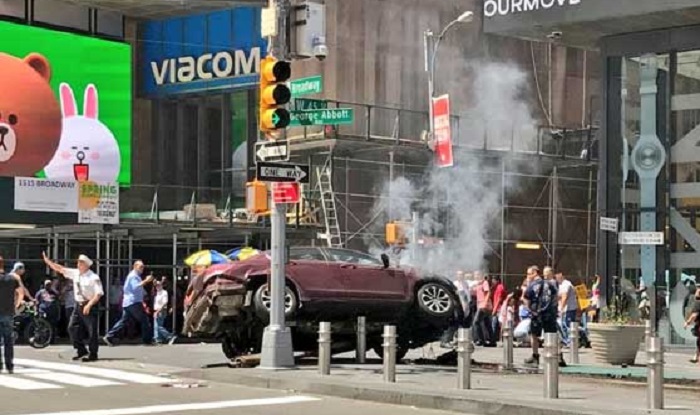 Times Square: Speeding car drives into crowd, kills 1, injures over 20; terrorism ruled out Times Square: Speeding car drives into crowd, kills 1, injures over 20; terrorism ruled out