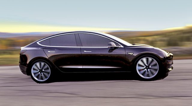 CEO Elon Musk shows off First Tesla Model 3 electric car rolling off production line CEO Elon Musk shows off First Tesla Model 3 electric car rolling off production line