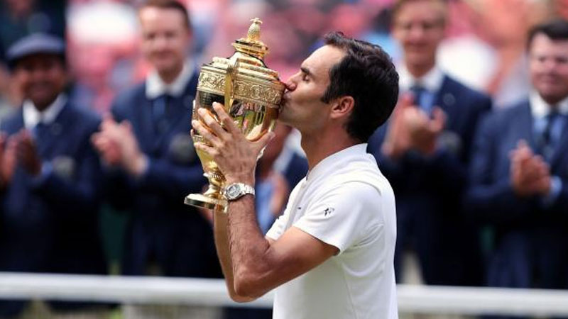 Swiss Tennis player Roger Federer after winning eighth Wimbledon title Swiss Tennis player Roger Federer after winning eighth Wimbledon title