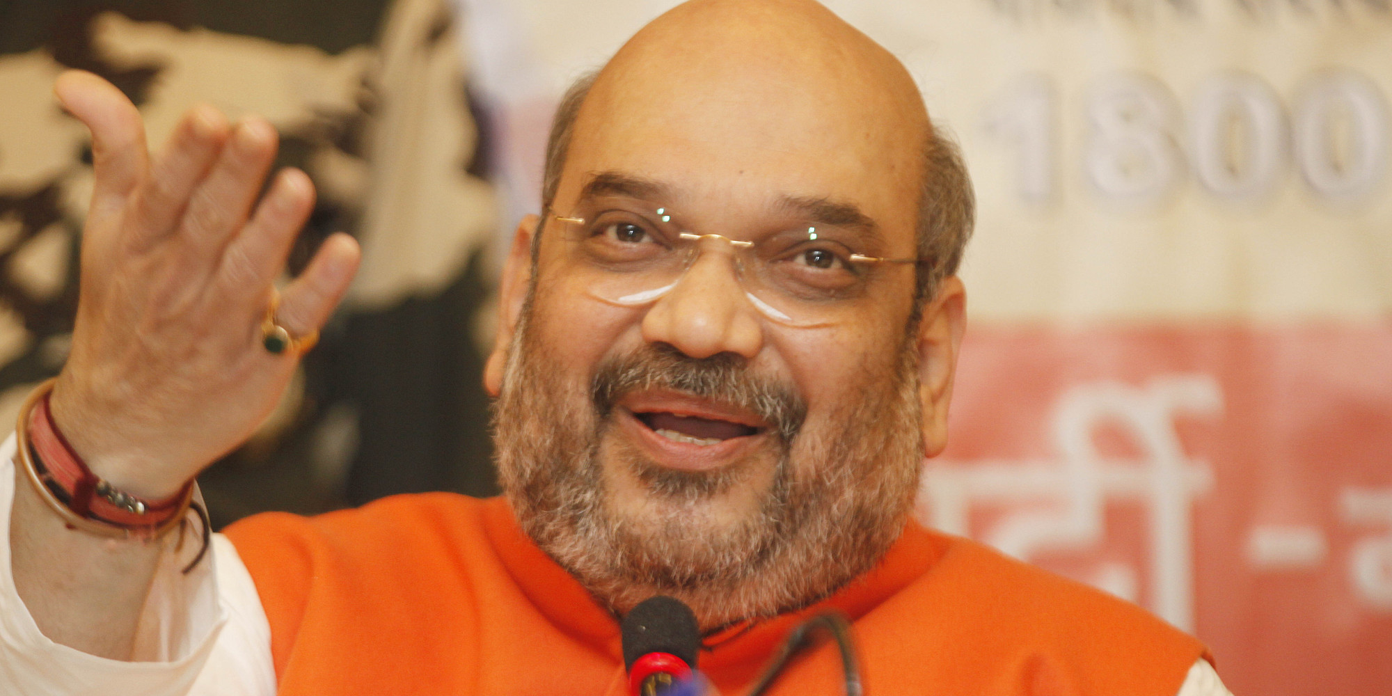 BJP Chief Amit Shah has lunch at BJP worker's house, interacts with family BJP Chief Amit Shah has lunch at BJP worker's house, interacts with family