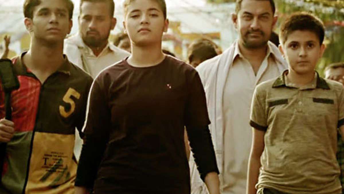 Screenshot from Dangal trailer showing Aamir Khan as wrestler Phogat with his daughters Screenshot from Dangal trailer showing Aamir Khan as wrestler Phogat with his daughters