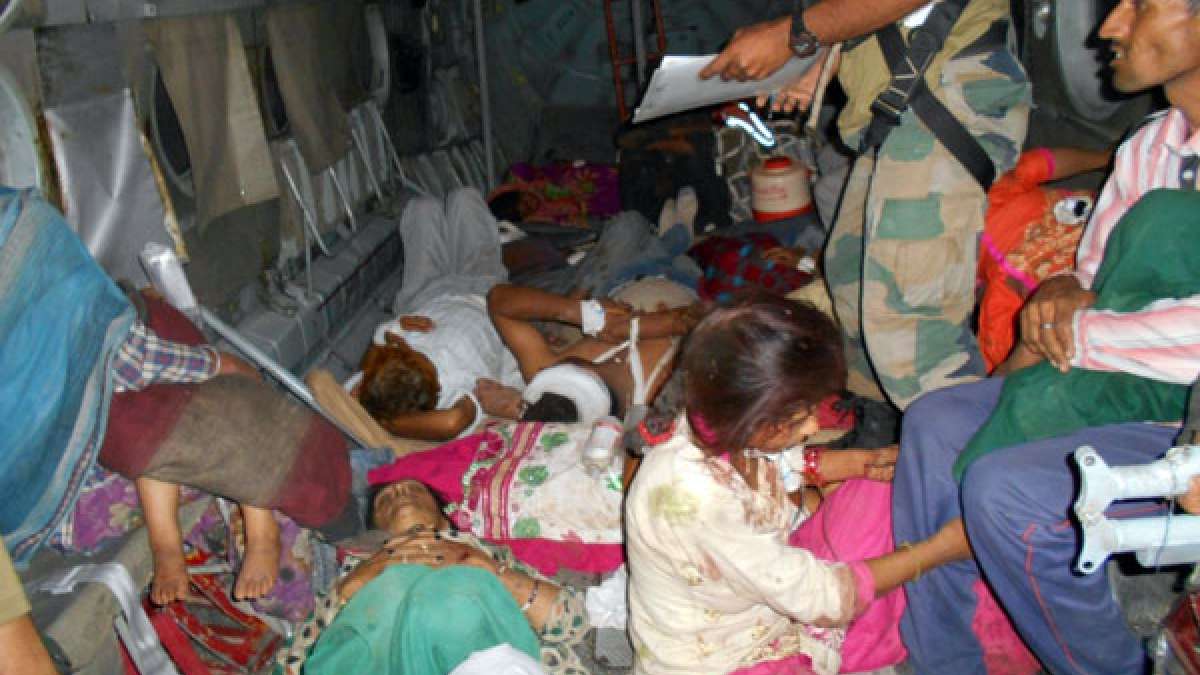 Injured people being airlifted in Indian Air Force helicopter Injured people being airlifted in Indian Air Force helicopter