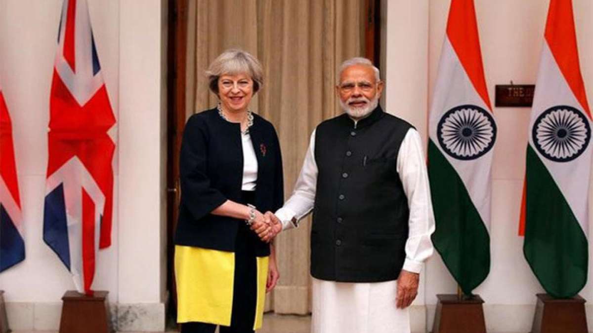 British Prime Minister Theresa May with PM Narendra Modi British Prime Minister Theresa May with PM Narendra Modi