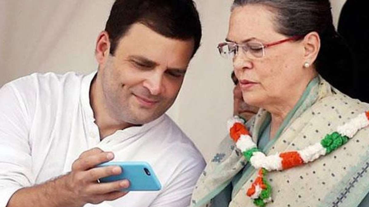 Rahul Gandhi and Sonia Gandhi checking a phone Rahul Gandhi and Sonia Gandhi checking a phone