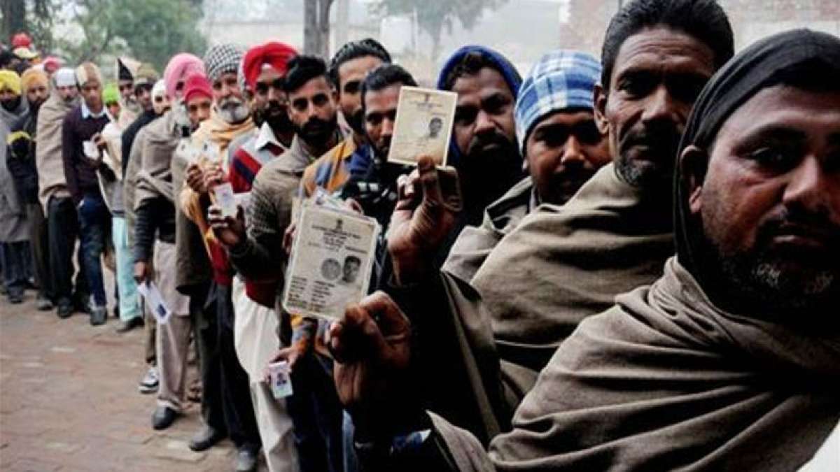 Elections 2017: Voters outside a polling booth Elections 2017: Voters outside a polling booth