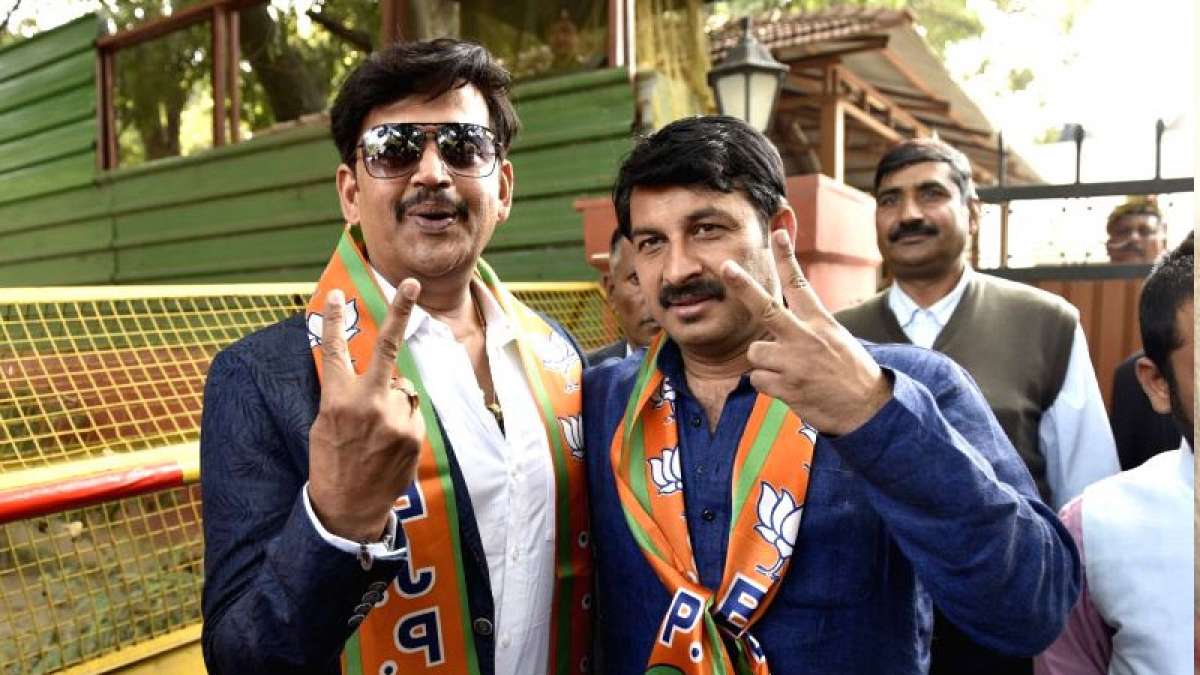 Actor Ravi Kishan poses with Manoj Tiwari after joining Bharatiya Janata Party Actor Ravi Kishan poses with Manoj Tiwari after joining Bharatiya Janata Party