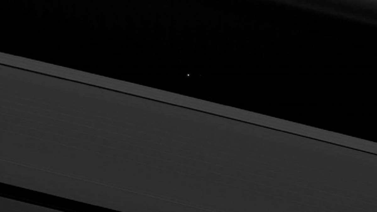 Earth Spotted as point of light from Saturn's Icy Rings by Cassini (Image: NASA) Earth Spotted as point of light from Saturn's Icy Rings by Cassini (Image: NASA)