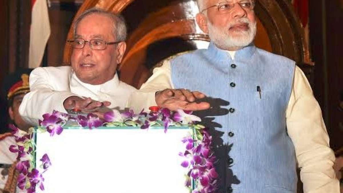 A minute after the stroke of midnight, President Pranab Mukherjee and Prime Minister Narendra Modi pressed the button to launch the new indirect tax regime on a digital screen with "GST" emblazoned on it in a golden hue. A minute after the stroke of midnight, President Pranab Mukherjee and Prime Minister Narendra Modi pressed the button to launch the new indirect tax regime on a digital screen with "GST" emblazoned on it in a golden hue.
