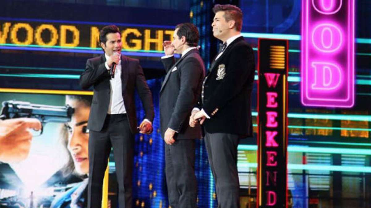 Varun Dhawan with Saif Ali Khan and Karan Johar at IIFA Awards Varun Dhawan with Saif Ali Khan and Karan Johar at IIFA Awards