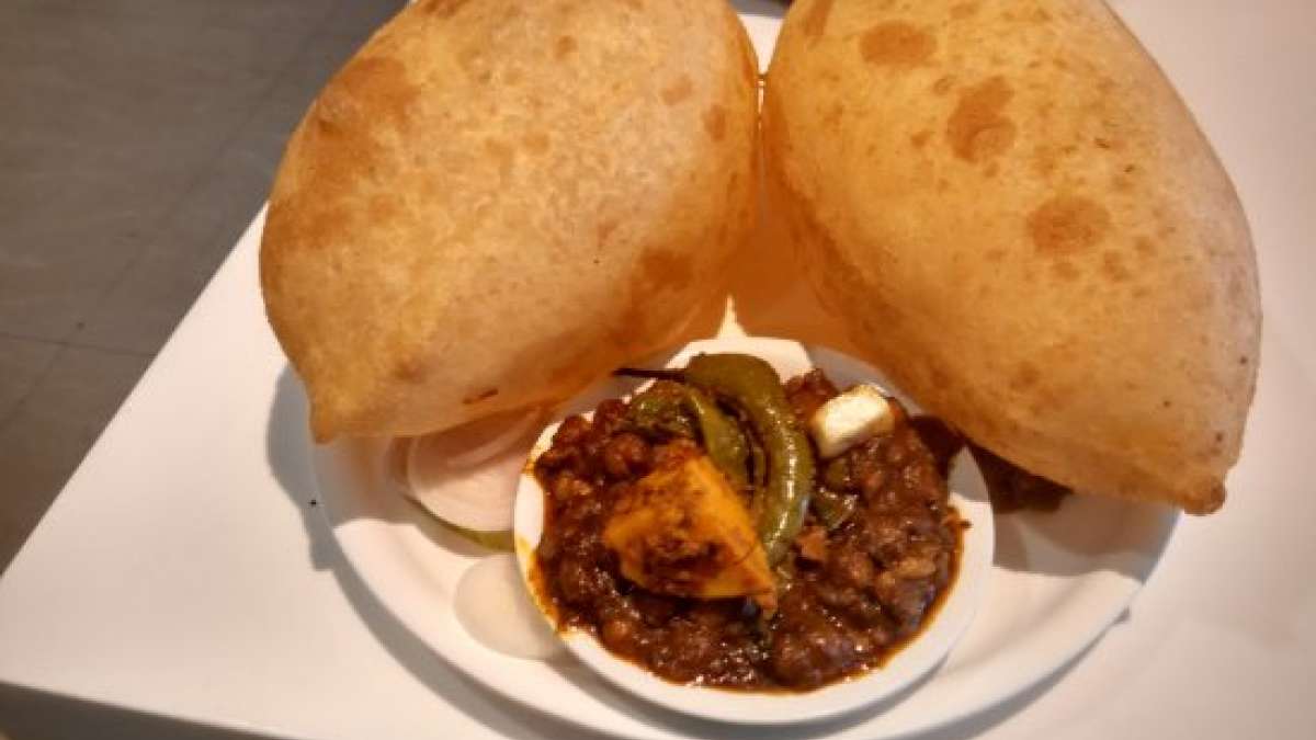 The hot and spicy chola bhatura lures many foodies to Delhi’s culinary hub. (Image source: Wikimedia Commons) The hot and spicy chola bhatura lures many foodies to Delhi’s culinary hub. (Image source: Wikimedia Commons)
