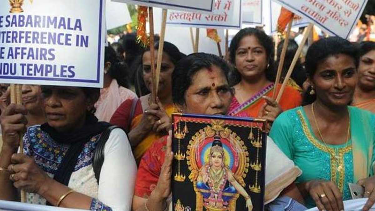 Clashes erupt at Sabarimala temple as woman approach lord Ayyappa shrine Clashes erupt at Sabarimala temple as woman approach lord Ayyappa shrine