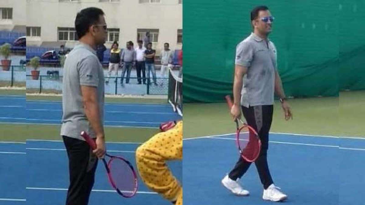 MS Dhoni tries his hands on tennis court MS Dhoni tries his hands on tennis court