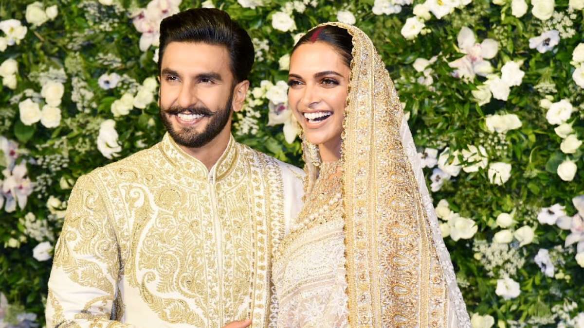 Deepika Padukone and Ranveer Singh in colour-coordinated ivory outfits Deepika Padukone and Ranveer Singh in colour-coordinated ivory outfits