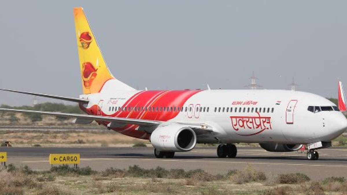 Man strips off mid-air on Air India flight, walks Aisle naked Man strips off mid-air on Air India flight, walks Aisle naked