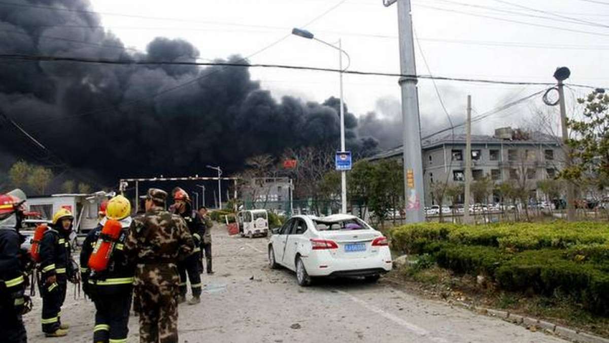 Rescuers walk near the site of a factory explosion in a chemical industrial park in Xiangshui County of Yancheng in eastern China's Jiangsu province. Rescuers walk near the site of a factory explosion in a chemical industrial park in Xiangshui County of Yancheng in eastern China's Jiangsu province.