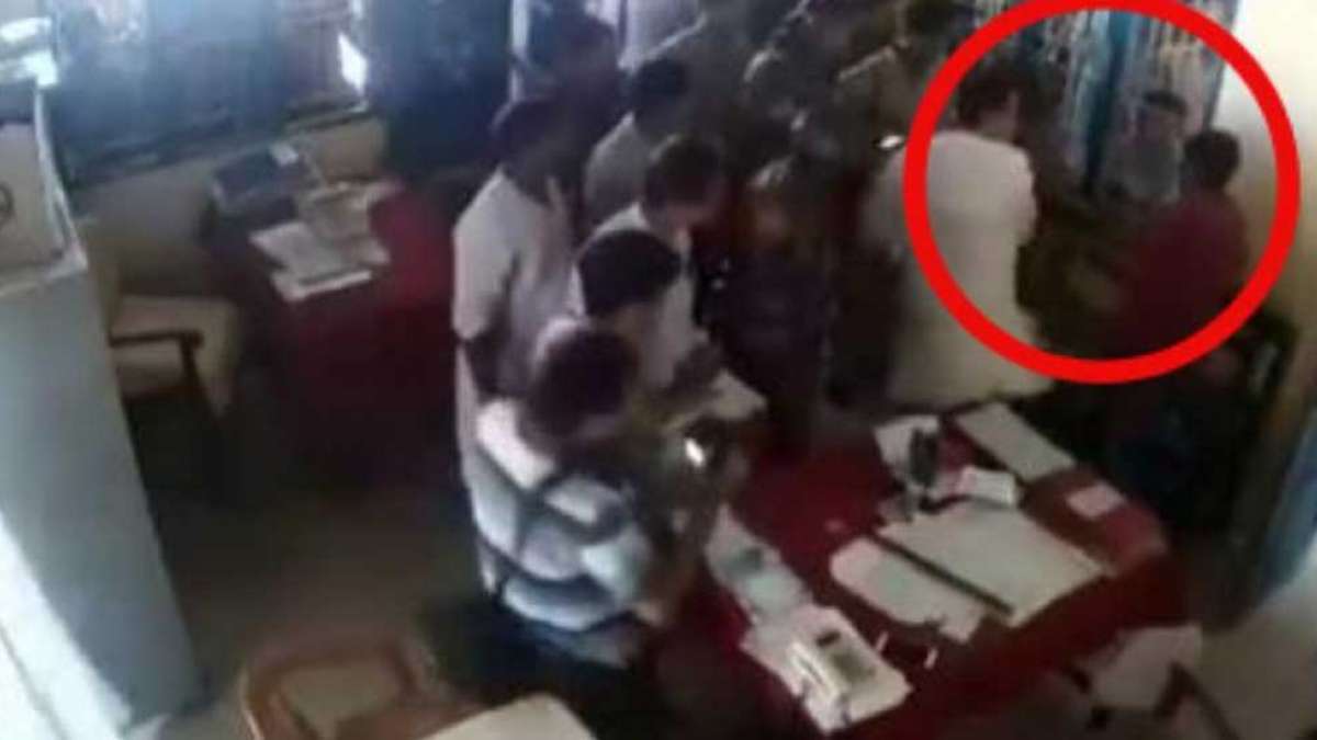 Watch: Tripura Congress president slaps man inside police station Watch: Tripura Congress president slaps man inside police station