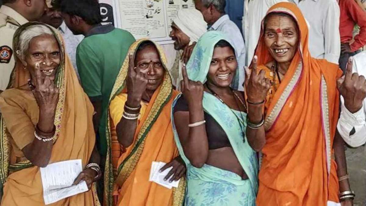 Voters in the queue to cast their votes for the fourth phase of election Voters in the queue to cast their votes for the fourth phase of election